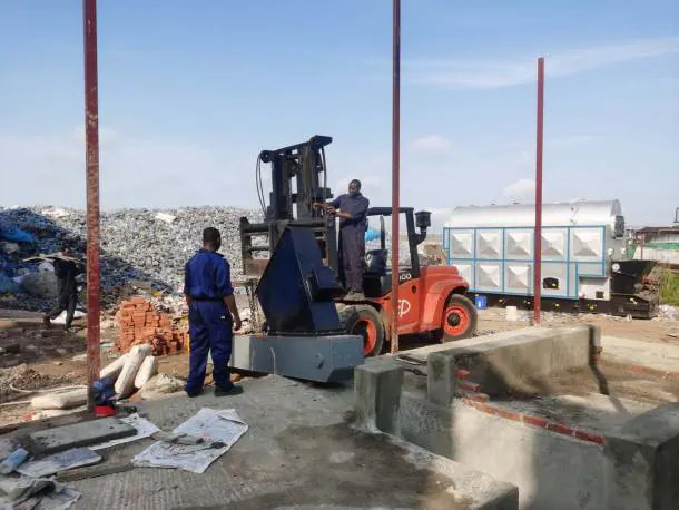 Installation on site: the boiler is set in place with a forklift.