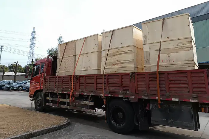 Trucks leaving the works for the port.