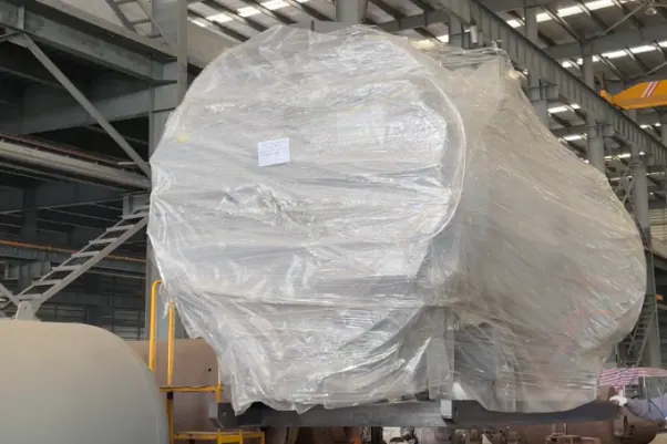The boiler wrapped in several layers of stretch film before loading.