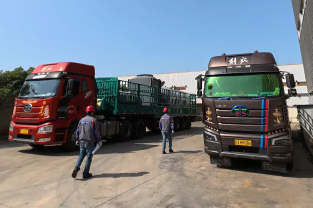Loading the containers and the frame trailer in the works yard.