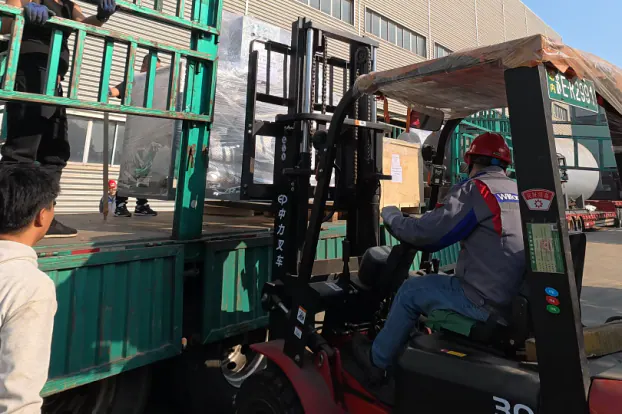 Loading the containers and the frame trailer in the works yard.