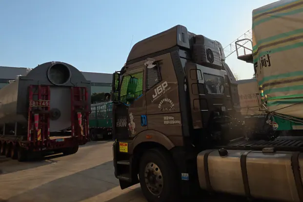 The four trucks ready to leave for the port.